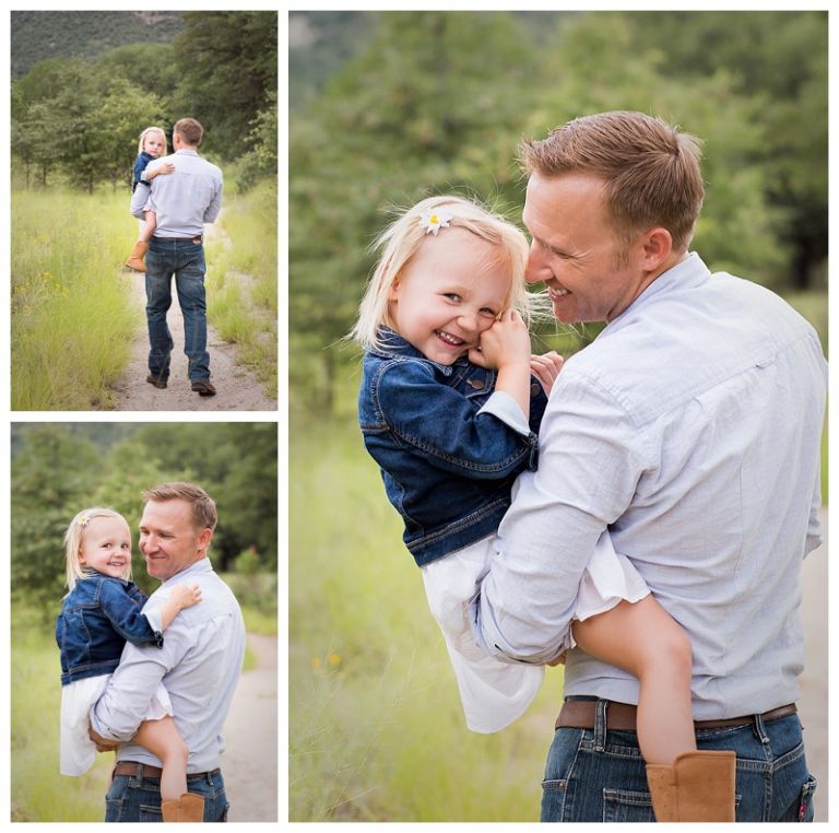 daddy holding daughter