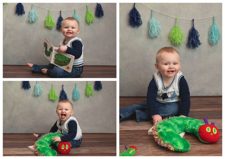 baby boy reading the very hungry caterpillar 