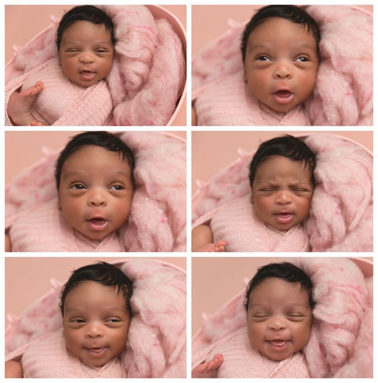 African American newborn baby girl smiling 
