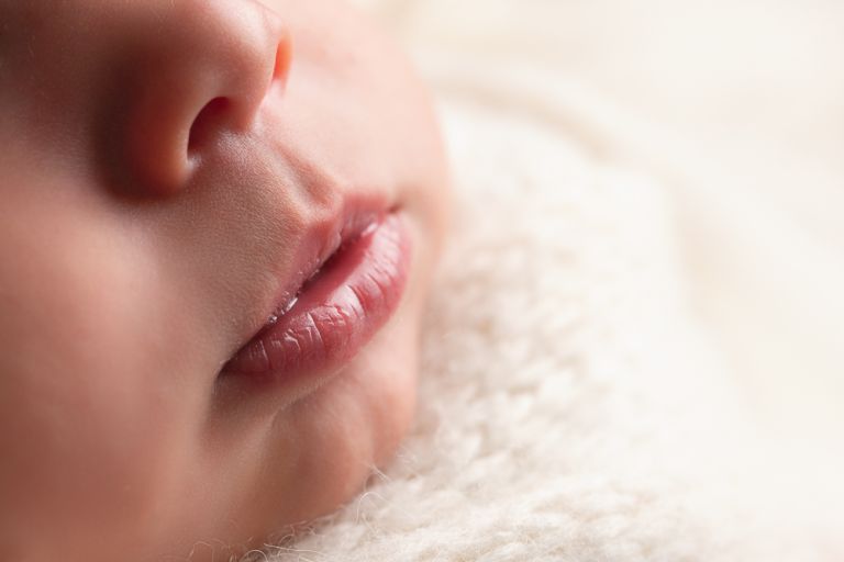 close up of newborn baby lips